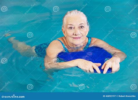 Old Woman Swimming With Kickboard In Pool Stock Image Image Of Learn Healthy 46892197
