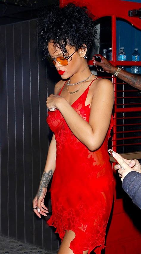 Rihanna Flashes Nipples As She Goes Braless In Revealing Sheer Red Slip
