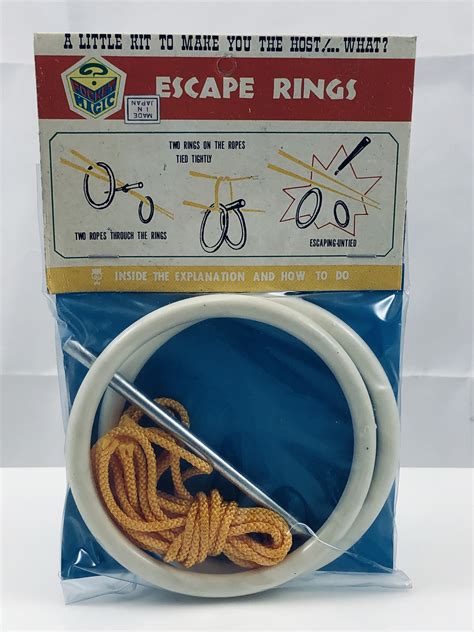 Lay the rings on the table so that the solid ring overlaps the ring with the. Escape Rings - Magic Methods