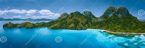 Aerial Drone Panoramic View Of Uninhabited Tropical Island With Rugged