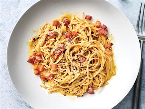 The dish arrived at its modern form, with its current name, in the middle of the 20th century. Our Whole-Wheat Pasta Carbonara Has Less Than 350 Calories Per Serving Recipe - Cooking Light