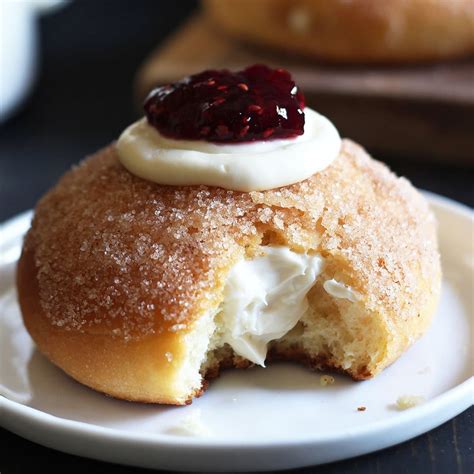 The basic cheesecake recipe is made with cream cheese, sour cream, egg yolks, sugar, and a touch of lemon juice. Cheesecake Stuffed Baked Doughnuts - Handle the Heat