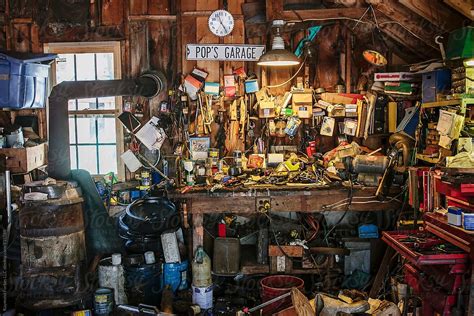 Messy Garage Interior By Stocksy Contributor Raymond Forbes Llc