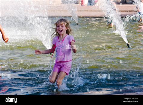 Kids Playing In Fountain Stock Photo Alamy