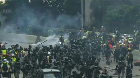 Tear Gas Fired As Hong Kong Police Protesters Clash Afp Youtube