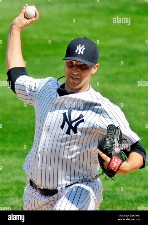 New York Yankees Pitcher Phil Hughes Throws Agianst The Tampa Bay Rays
