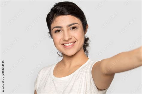 Head Shot Portrait Smiling Indian Girl Taking Selfie Video Call Stock