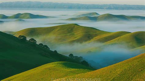 Aerial View Of Hills Covered With Fog During Day Time Hd Wallpaper
