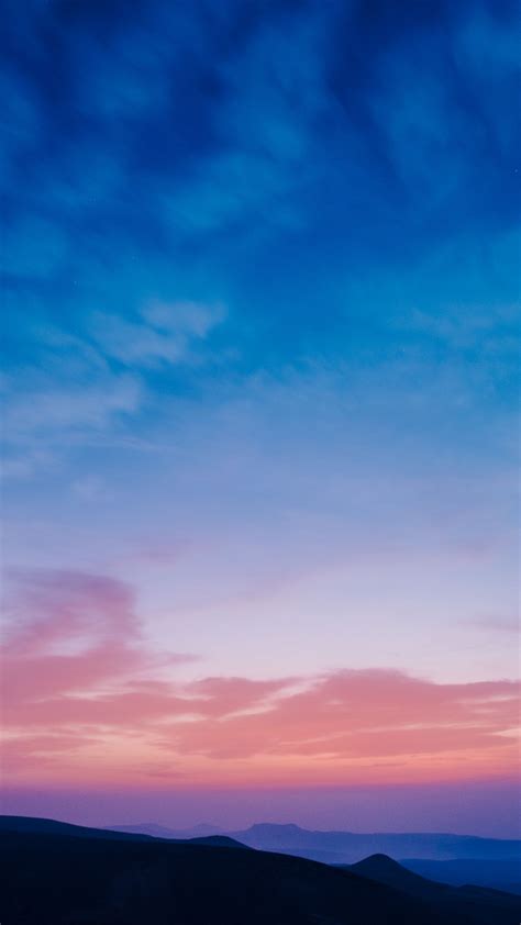 Download Wallpaper 1350x2400 Valley Clouds Sunset Distance Sky