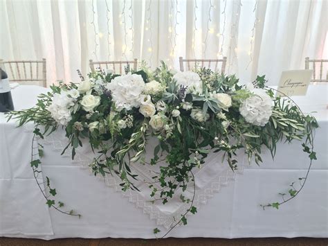 This coffee table arrives fully assembled. white long low jilljeffries.com | Wedding top table, Wedding table flowers