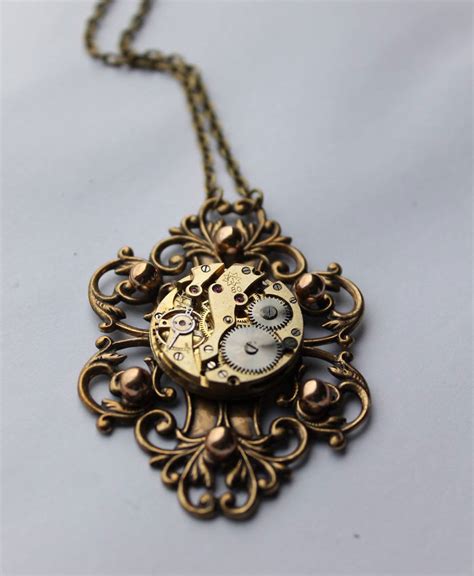 Come and play in the messy workshop with b'sue as she discusses the use of gears, propellers, wheels, watch parts, buckles and american made brass stampings to make cool. Steampunk Jewelry By This Russian Artist Will Take You ...