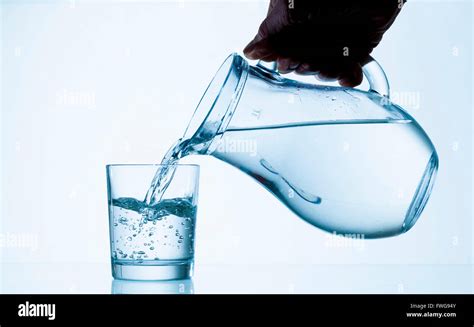 Jug Pouring Water Glass Hi Res Stock Photography And Images Alamy