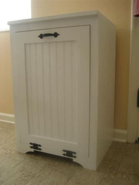 Apr 16, 2019 · your trash cans can be hidden inside any kitchen cabinets but the most popular idea is a separate cabinet with a tilt out trash can. 29 Sneaky Ways To Hide A Trash Can In Your Kitchen - DigsDigs