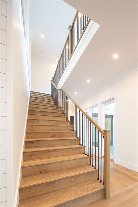 A farmhouse stair railing might not be at the top of your list when refreshing your home, but we think it should be given a higher priority. New-Construction Modern Farmhouse Inspiration - Home Bunch Interior Design Ideas