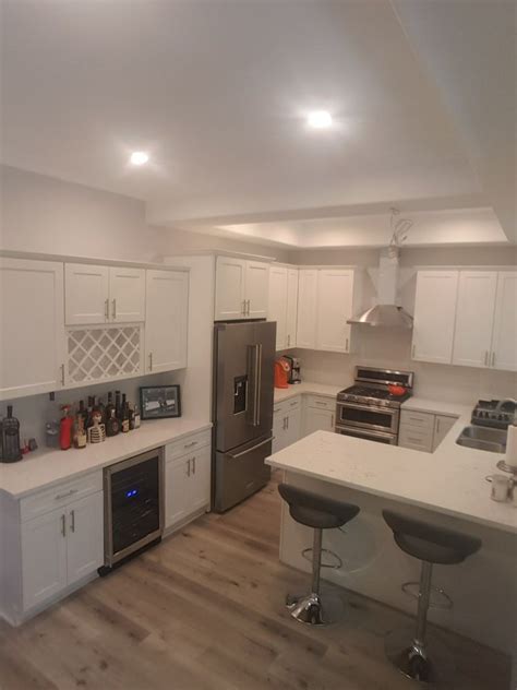 The quality of work is superb, i only could say positive things about this company. White shaker cabinets with quartz countertop installed by Magnolia Floors and More Inc - Yelp