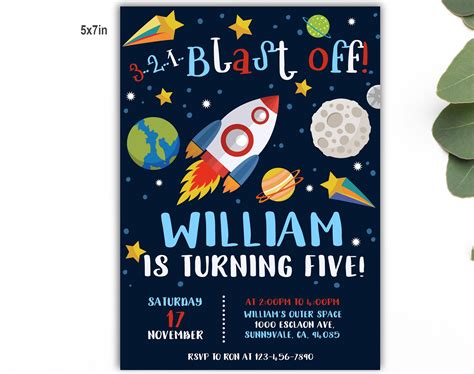 A Space Themed Birthday Party With A Rocket Ship And Stars On The