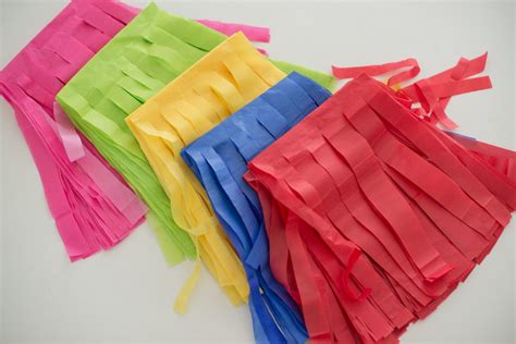 It keeps your costs down, and your decorations looking exactly as vibrant and beautiful as you imagine them to be. Domestic Fashionista: Tissue Paper Party Decorations