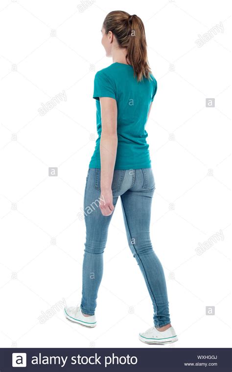 Casual Woman Walking Away From The Camera Stock Photo Alamy