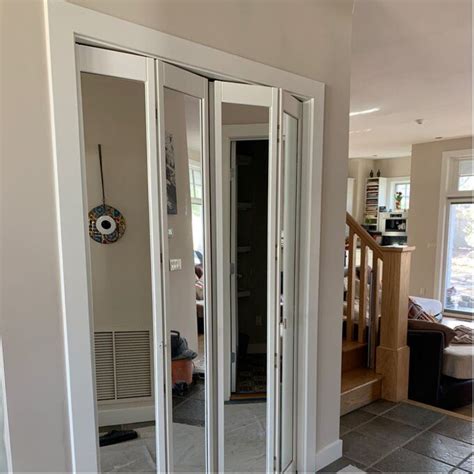 Got outdated mirrored closet doors? Mirrored Wood and Glass Unfinished Bi-Fold Door in 2020 ...