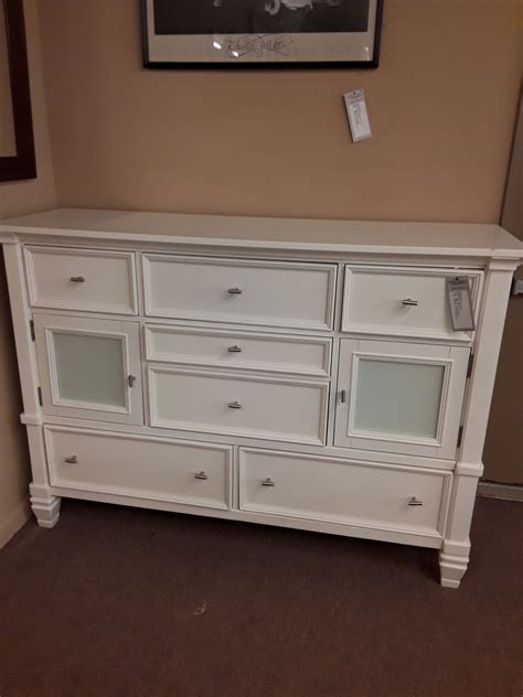 Matte finishes, including wood, white or black. WHITE TRIPLE DRESSER | Delmarva Furniture Consignment