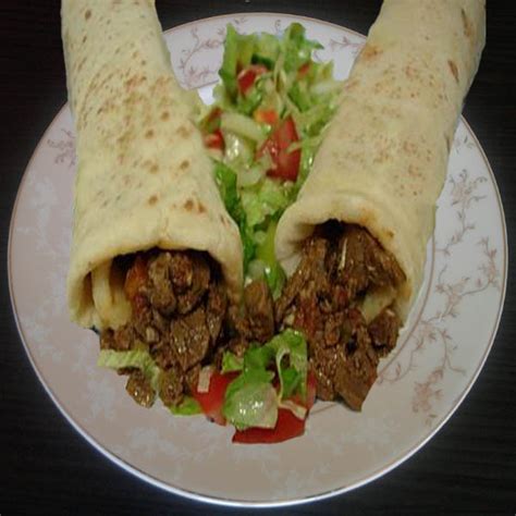Traditionally, the dish is served rolled in a durum wheat wrap, with ground sumac and a. Tantuni