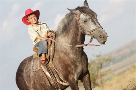 Boy Riding A Horse On Farm Outdoors Royalty Free Stock Image Image