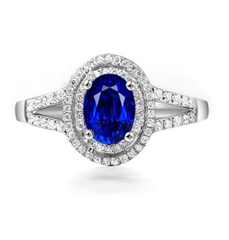 Shop 2 carat diamond and sapphire engagement rings and other antique and vintage rings from top jewelers around the world. 2 Carat oval cut Blue Sapphire and Diamond Halo Engagement Ring in White Gold - JeenJewels