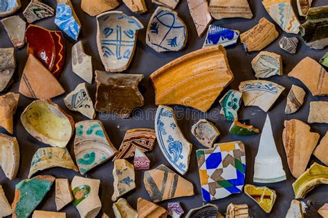 Background From Pieces Of Clay Colored Broken Pottery Decoration