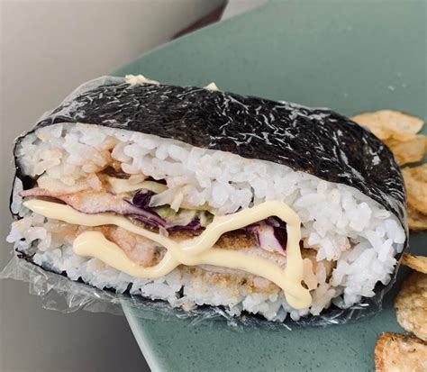 Takoyaki $9.9 cuttlefish ball topped with bonito flakes in special sauce. Chicken Katsu Onigirazu with Kewpie Mayo - Alo Japan