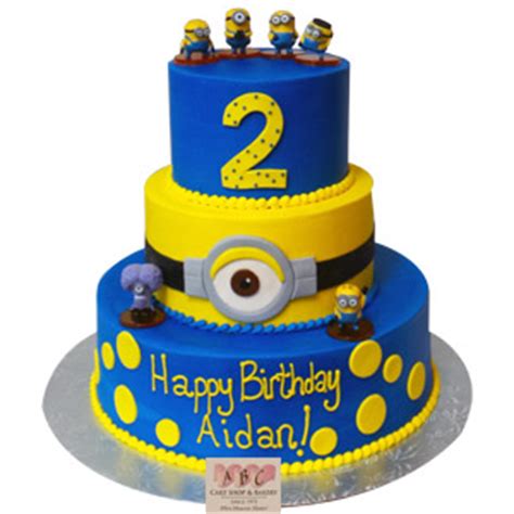 A minion cake makes a perfect celebration cake for kids any age be it a boy or girl. (2183) 3 Tier Minion Birthday Cake - ABC Cake Shop & Bakery