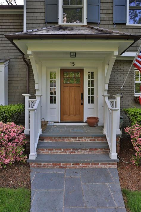 A small railing/balcony has been added around the top. Front stoop, slate and brick, awning | Front porch steps ...
