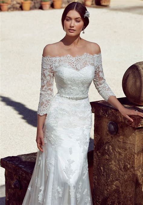 Known as blue bird dress in the beginning, the company changed their name to paloma blanca and later introduced sister collection and brand, mikaella. M1824L | Piper | Wedding dresses, Lace weddings, Elegant ...