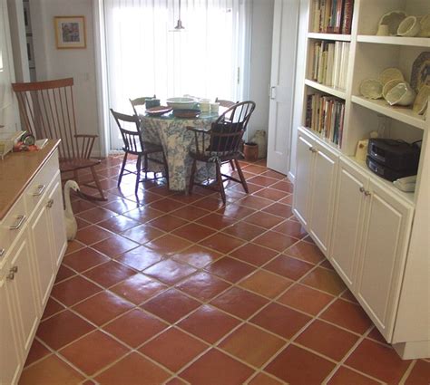 I recently had a designed in a click consultation with a homeowner who had terracotta or saltillo tile floors in her kitchen and wanted to do a remodel. Terracotta Kitchen Floor - Kitchen - by Rustico Tile and Stone