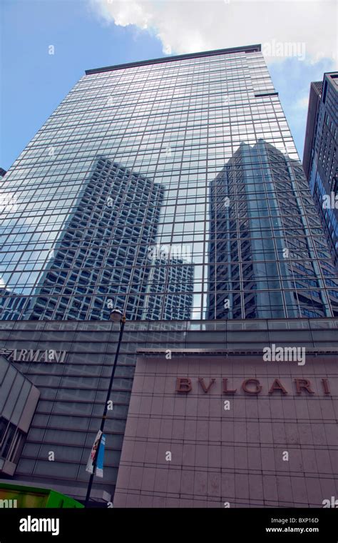 The Bvlgari And Armani Buildings Next To Each Other In Hong Kong Stock