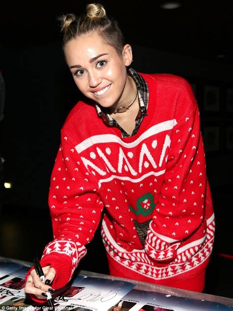 Miley Cyrus Adds New Moves To Racy Jingle Ball Routine As She Spanks Christmas Tree Daily Mail