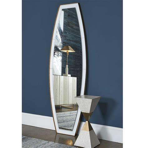 This mirror can certainly serve as a focal point for any room. Elongated Mirror | Uttermost