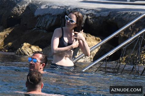 Lily Collins Sexy Enjoying The Weather With A Swim In Ischia Italy