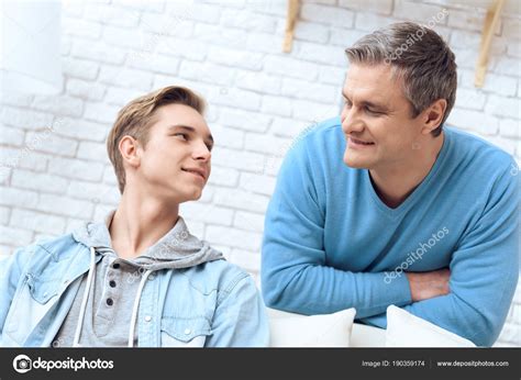 Father Son Talking Each Other Home Stock Photo By ©freeograph 190359174