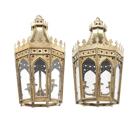 A Pair Of Sheet Brass Gothic Style Lanterns Retailed By Charles