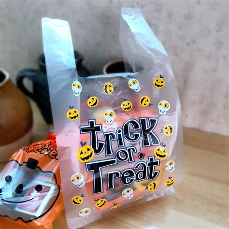 100pcs Halloween Pumpkin Supermarket Shopping Bag Vest Plastic Bags