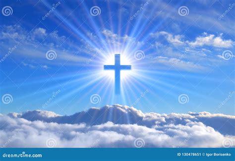Religious Cross Over Cumulus Clouds Illuminated By The Rays Of Holy