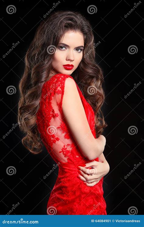 Long Hair Beautiful Brunette Woman In Red Lace Dress Stock Image