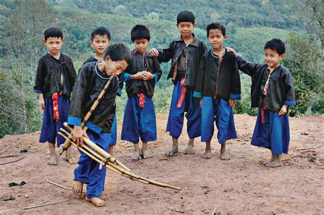 hmong-tsai-boys,-new-year-festival,-playing-the-gheng,-phongsali,-laos,-2005-media-suzuki