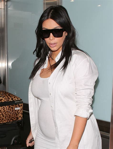 Pregnant Kim Kardashian At Los Angeles International Airport 08042015