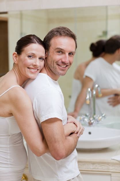 Premium Photo Couple Hugging In The Bathroom