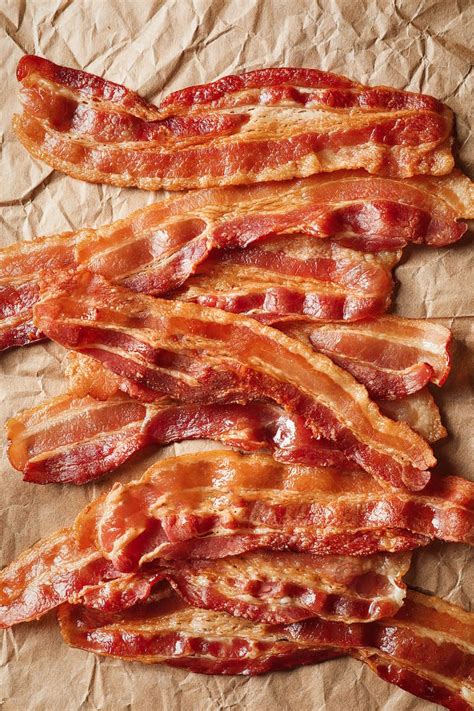 Put the baking sheet inside the preheated oven, then bake your turkey until the bacon turns golden or brown and crispy. How to cook bacon in the oven! | The Novice Chef
