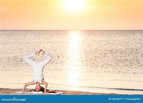 Young Girl Doing Yoga At Sunrise On Beach Stock Image Image Of Beach