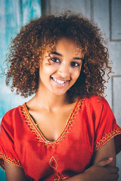 Portrait Of Happy Young Ethiopian Woman In Traditional Clothing