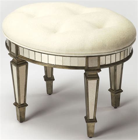 Has a comfortable cushioned top. Garbo Mirrored Vanity Stool from Butler | Coleman Furniture