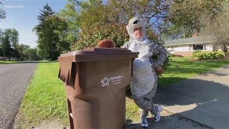 Happy Trash Day Woman Entertains Neighbors By Wearing Costumes To